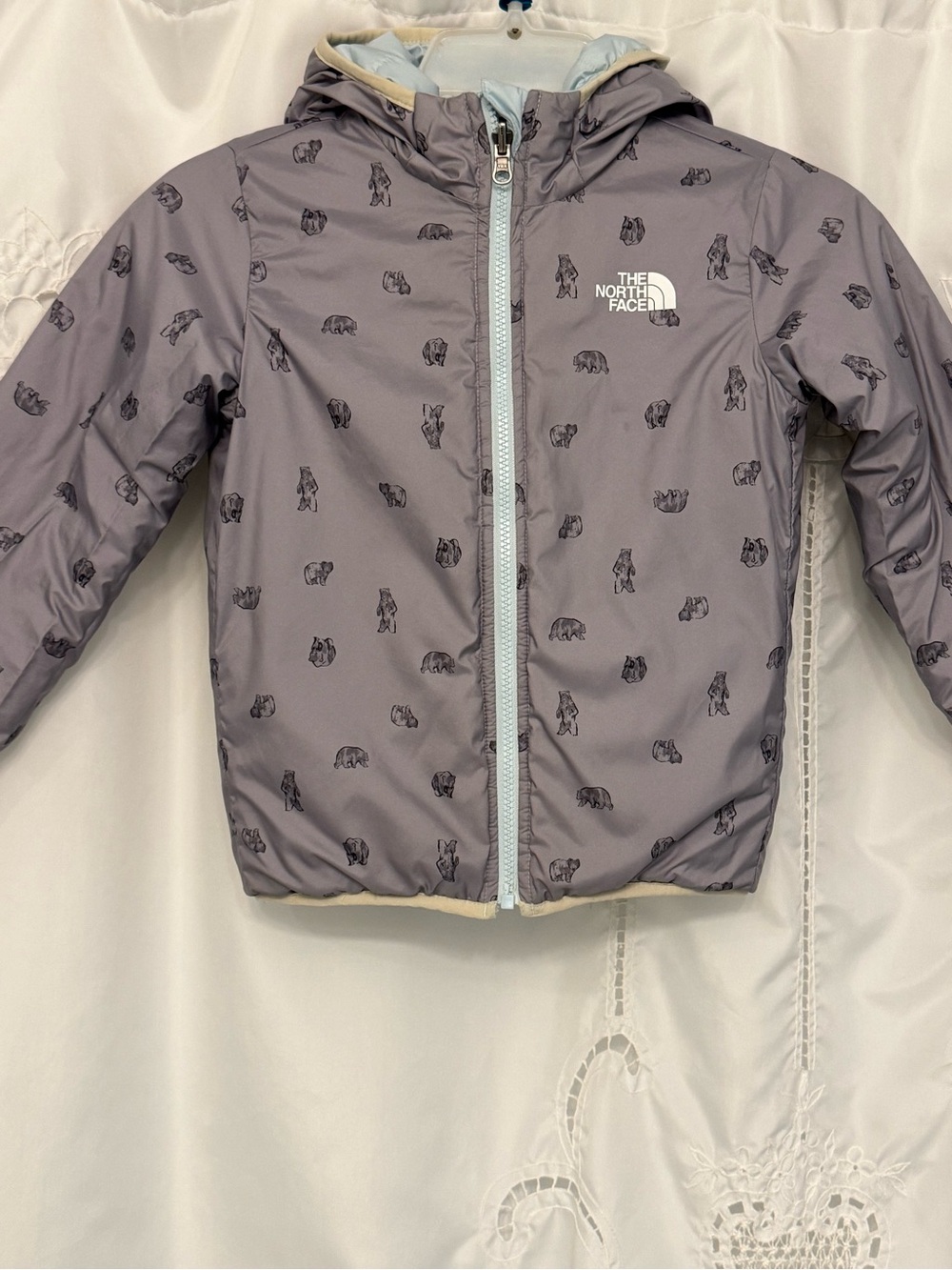 Child’s North Face Reversible quilted jacket.